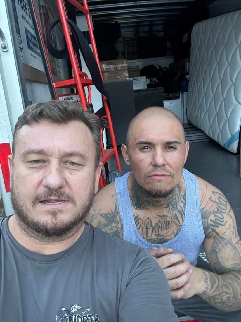 Two men together during prison ministry outreach