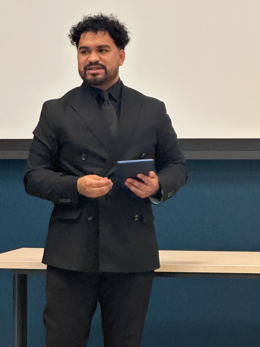 Gerson Torres speaking during Miracle Service